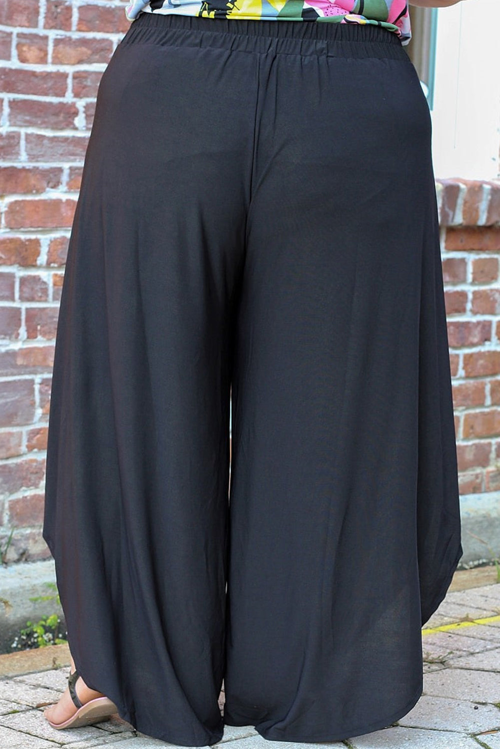 Get trendy with Plus Size Tie Front Wide Leg Pants - Plus Size available at Styles Code. Grab yours today!