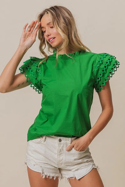 Get trendy with Woven Circle Trim Ruffle Top - Top available at Styles Code. Grab yours today!