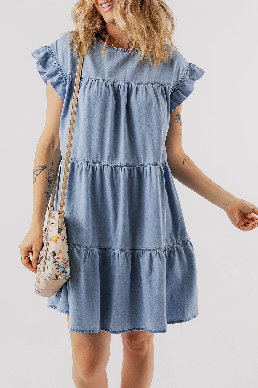 Get trendy with Ruffled Round Neck Cap Sleeve Denim Dress - Denim Dress available at Styles Code. Grab yours today!