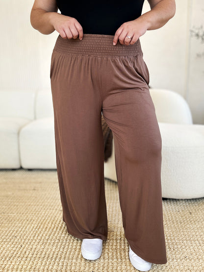 Get trendy with Full Size Smocked Wide Waistband Pants - Pants available at Styles Code. Grab yours today!