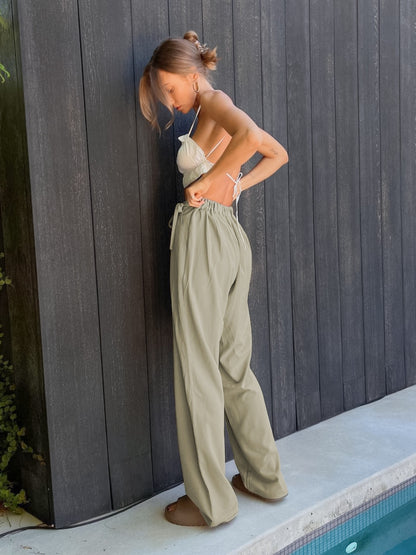 Get trendy with Tied High Waist Wide Leg Pants - Pants available at Styles Code. Grab yours today!