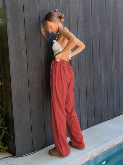 Get trendy with Tied High Waist Wide Leg Pants - Pants available at Styles Code. Grab yours today!