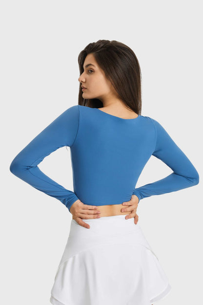 Get trendy with Cutout Long Sleeve Cropped Sports Top - Activewear available at Styles Code. Grab yours today!