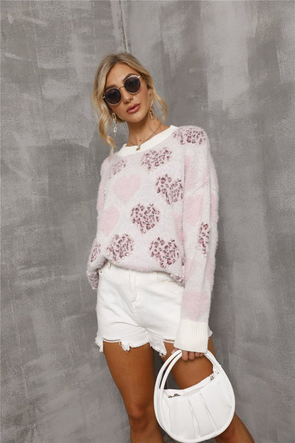 Get trendy with Heart Pattern Round Neck Long Sleeve Sweater - Sweater available at Styles Code. Grab yours today!