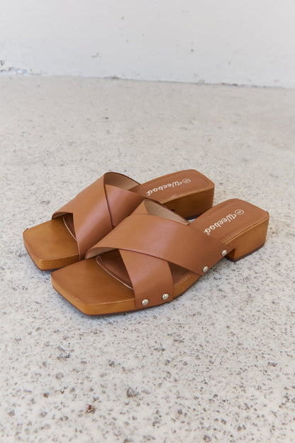 Get trendy with Weeboo Step Into Summer Criss Cross Wooden Clog Mule in Brown - Shoes available at Styles Code. Grab yours today!