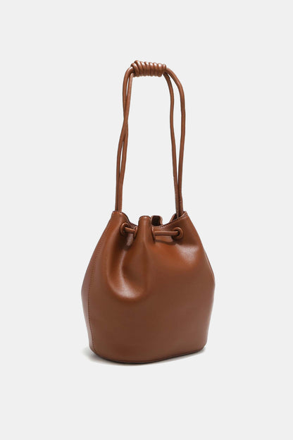 Get trendy with Nicole Lee USA Amy Studded Bucket Bag - Bags available at Styles Code. Grab yours today!