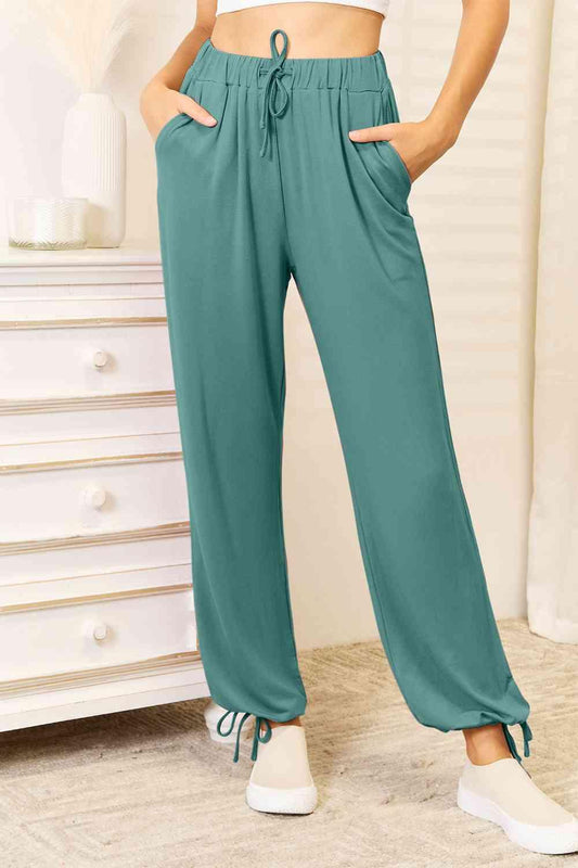 Get trendy with Full Size Rayon Drawstring Pants - Bottoms available at Styles Code. Grab yours today!