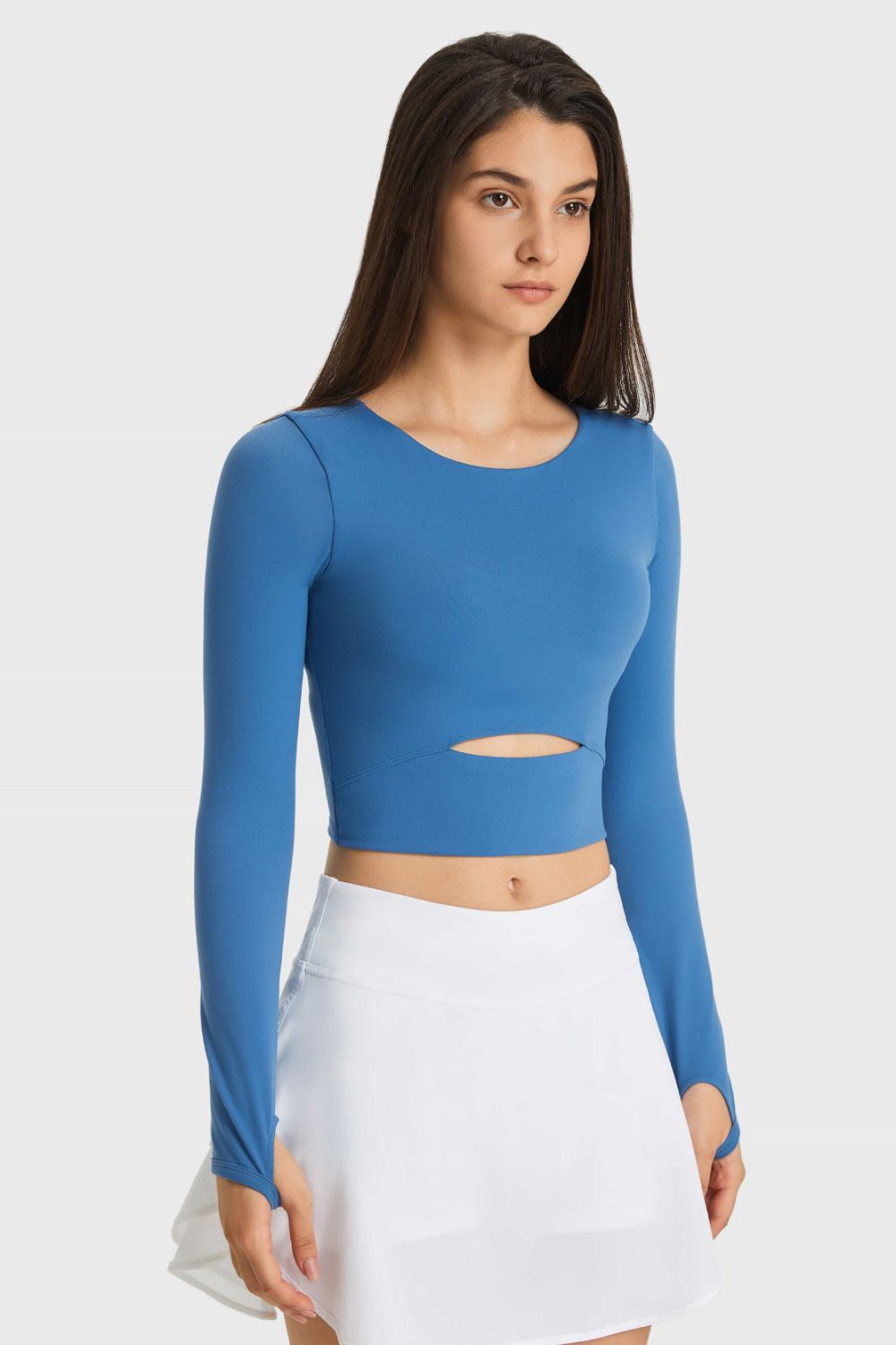 Get trendy with Cutout Long Sleeve Cropped Sports Top - Activewear available at Styles Code. Grab yours today!