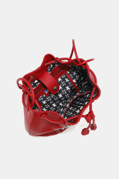 Get trendy with Nicole Lee USA Amy Studded Bucket Bag - Bags available at Styles Code. Grab yours today!