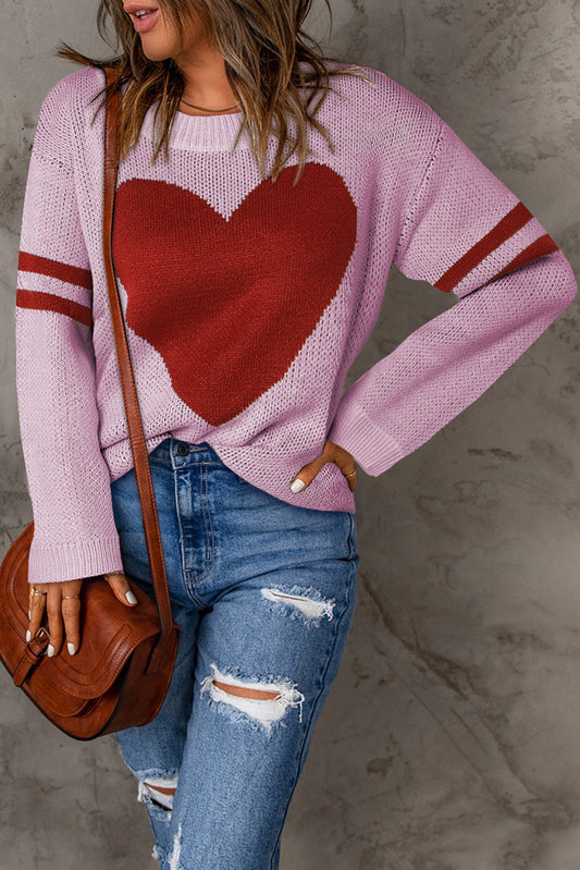 Get trendy with Heart Graphic Round Neck Sweater - Sweater available at Styles Code. Grab yours today!