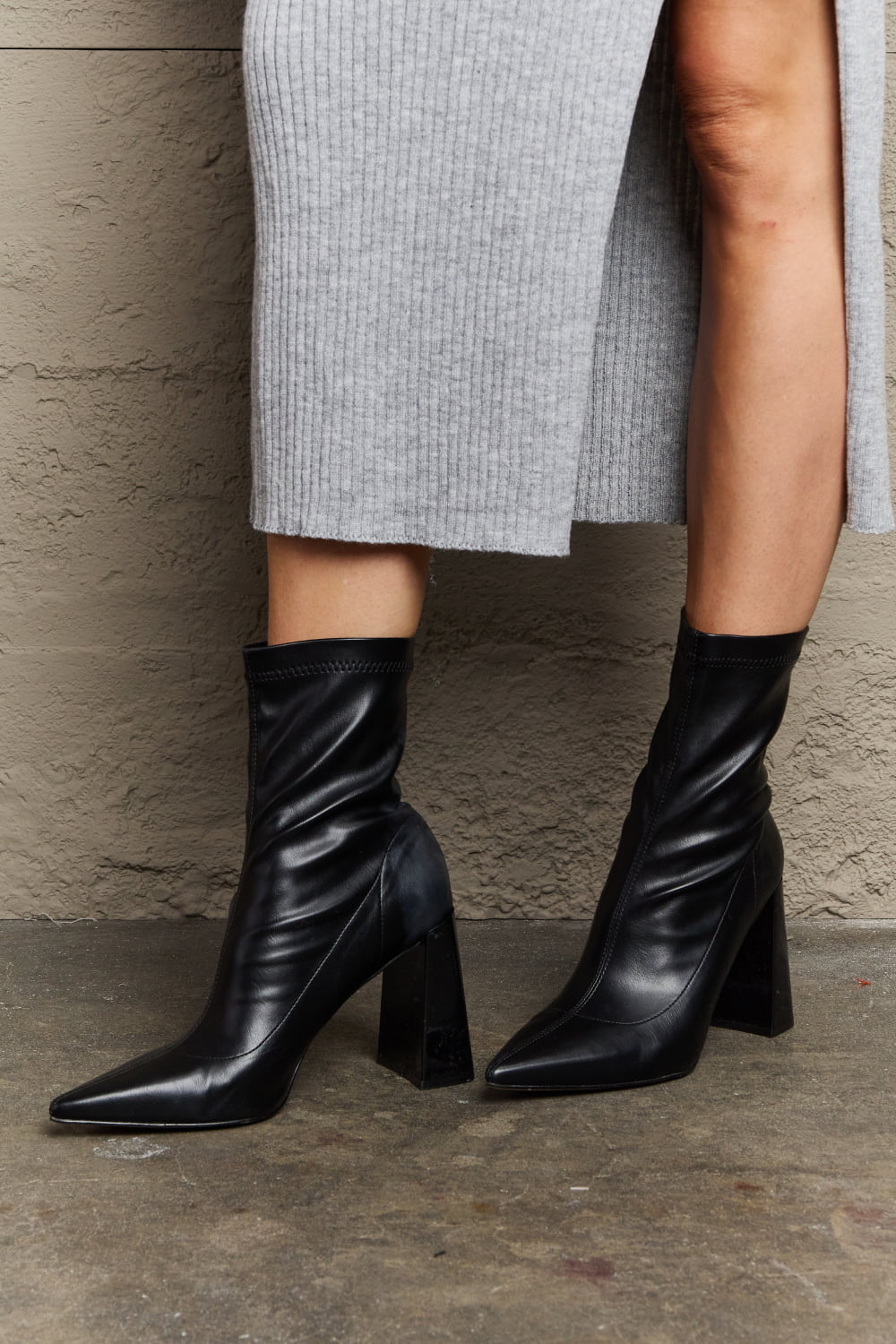 Get trendy with Weeboo Stacy Block Heel Sock Boots - Shoes available at Styles Code. Grab yours today!