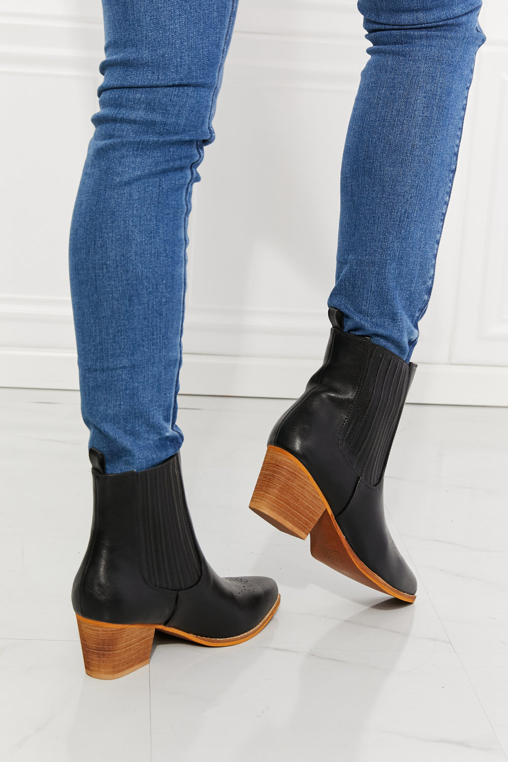 Get trendy with MMShoes Love the Journey Stacked Heel Chelsea Boot in Black - Shoes available at Styles Code. Grab yours today!