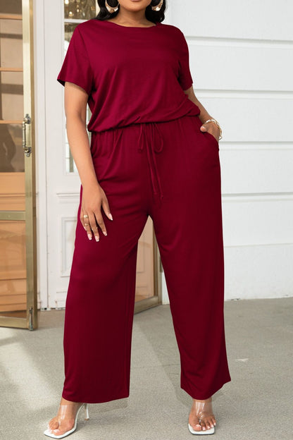 Get trendy with Plus Size Drawstring Waist Short Sleeve Jumpsuit - Plus size available at Styles Code. Grab yours today!