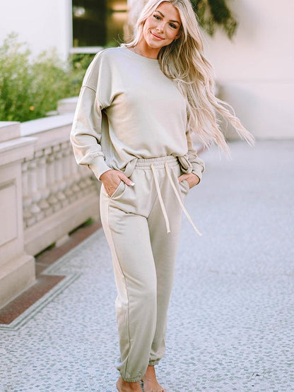 Get trendy with Dropped Shoulder Top and Pants Lounge Set - Two Piece Sets available at Styles Code. Grab yours today!