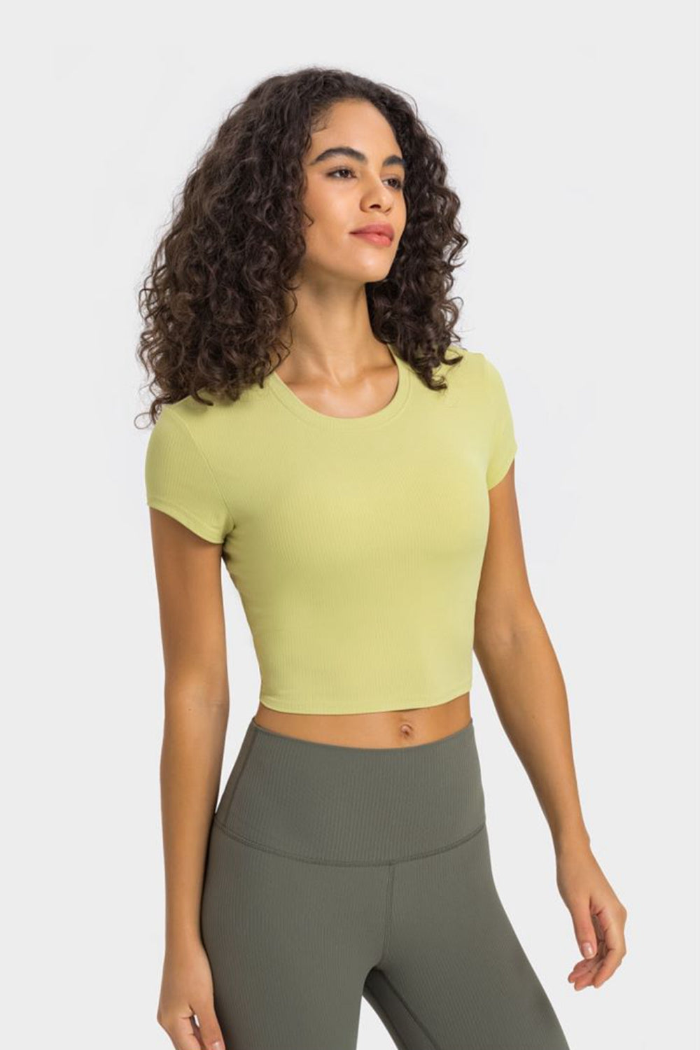 Get trendy with Round Neck Short Sleeve Cropped Sports T-Shirt - Activewear available at Styles Code. Grab yours today!