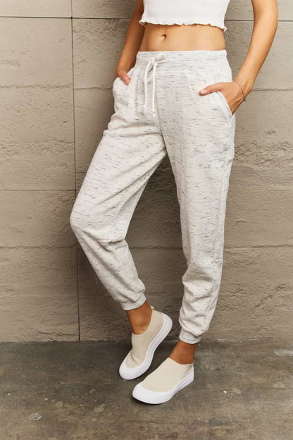 Get trendy with Full Size Tie Waist Long Sweatpants - Plus Size available at Styles Code. Grab yours today!