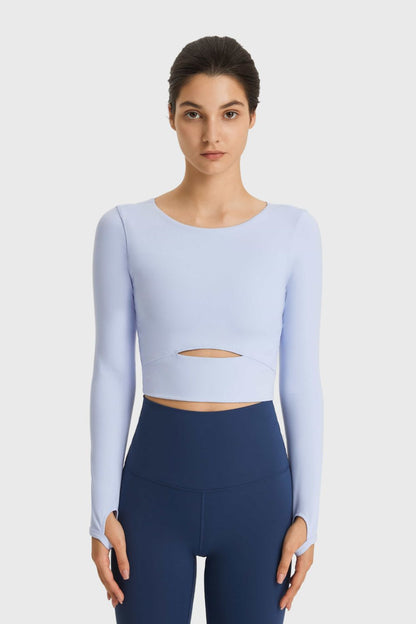 Get trendy with Cutout Long Sleeve Cropped Sports Top - Activewear available at Styles Code. Grab yours today!