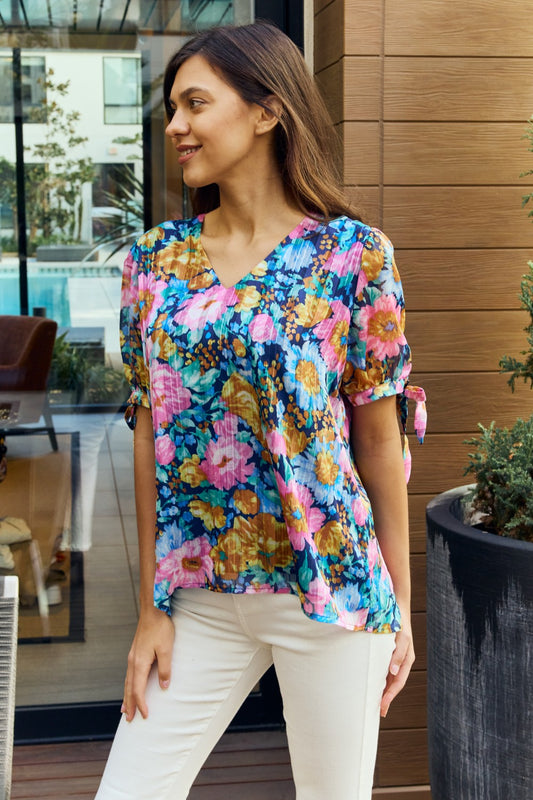 Get trendy with Petal Dew Full Size Floral V-Neck Tie Detail Blouse -  available at Styles Code. Grab yours today!