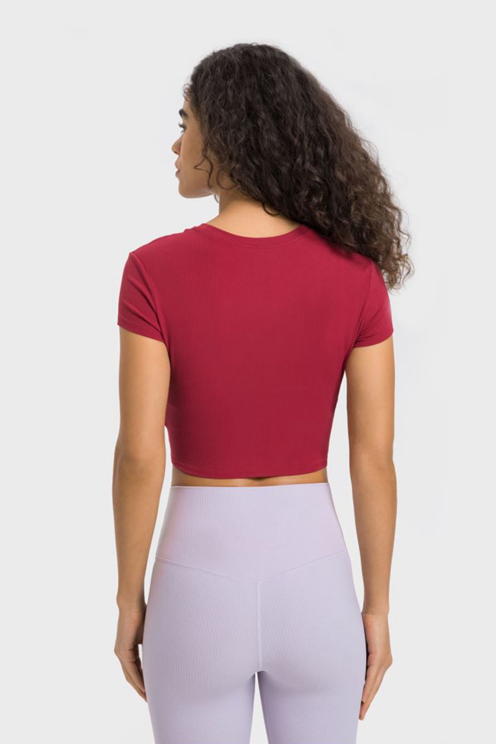 Get trendy with Round Neck Short Sleeve Cropped Sports T-Shirt - Activewear available at Styles Code. Grab yours today!