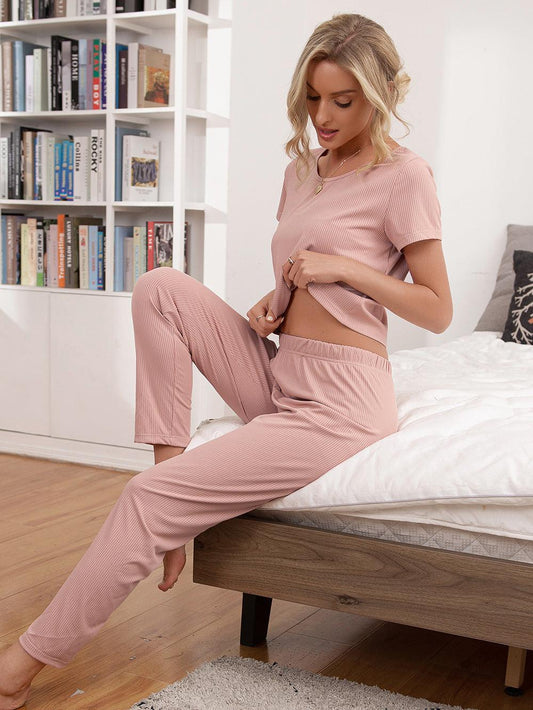 Get trendy with Round Neck Short Sleeve Top and Pants Lounge Set - Two Piece Sets available at Styles Code. Grab yours today!