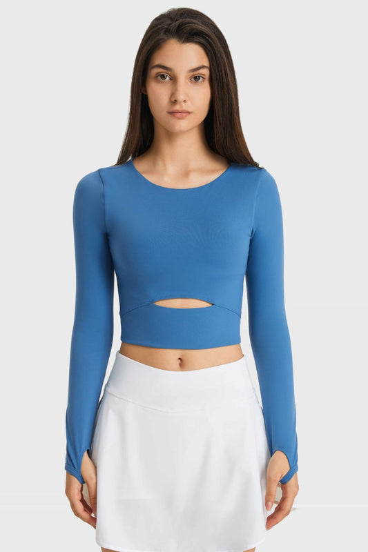 Get trendy with Cutout Long Sleeve Cropped Sports Top - Activewear available at Styles Code. Grab yours today!