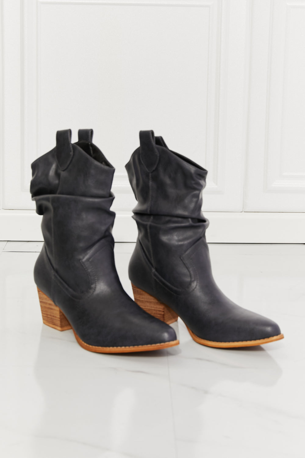 Get trendy with MMShoes Better in Texas Scrunch Cowboy Boots in Navy - Shoes available at Styles Code. Grab yours today!