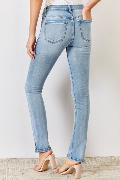 Get trendy with Kancan Full Size Mid Rise Y2K Slit Bootcut Jeans -  available at Styles Code. Grab yours today!