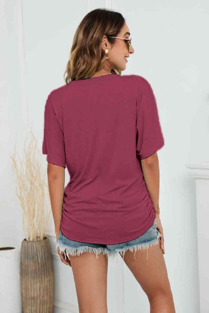 Get trendy with V-Neck Side Ruched Tee - T-Shirt available at Styles Code. Grab yours today!