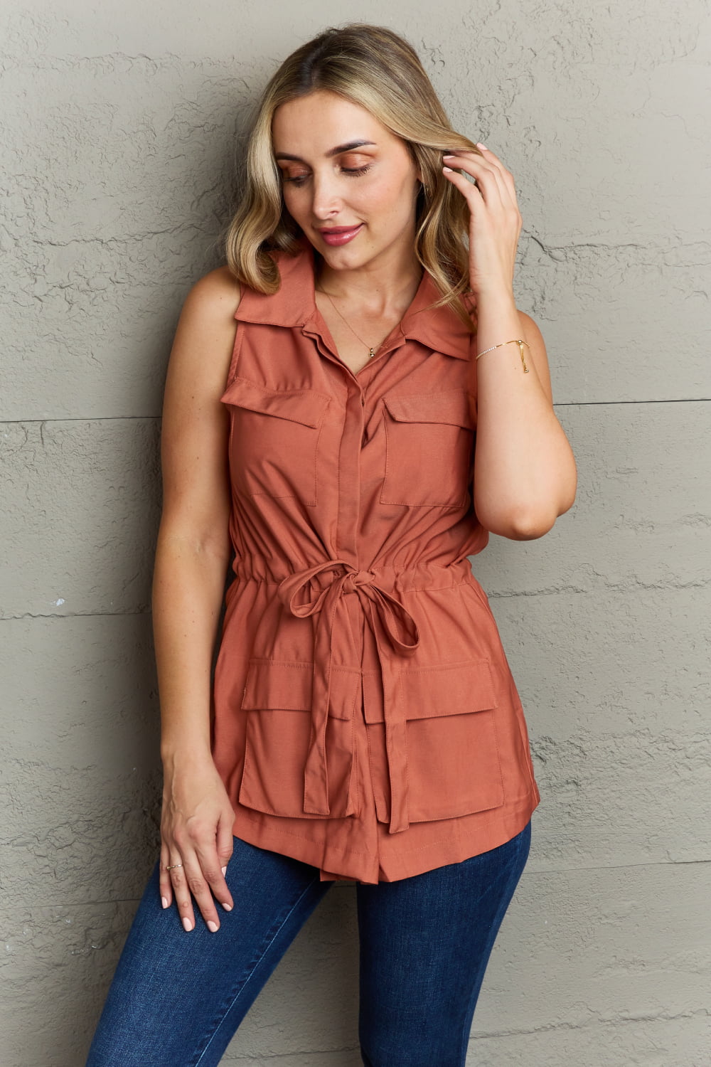 Get trendy with Sleeveless Collared Button Down Top -  available at Styles Code. Grab yours today!