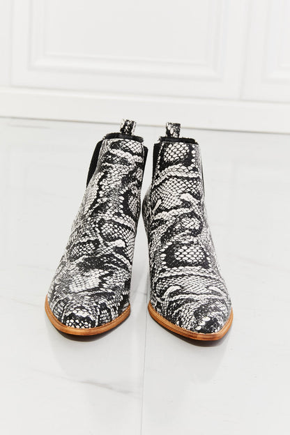 Get trendy with MMShoes Back At It Point Toe Bootie in Snakeskin - Shoes available at Styles Code. Grab yours today!