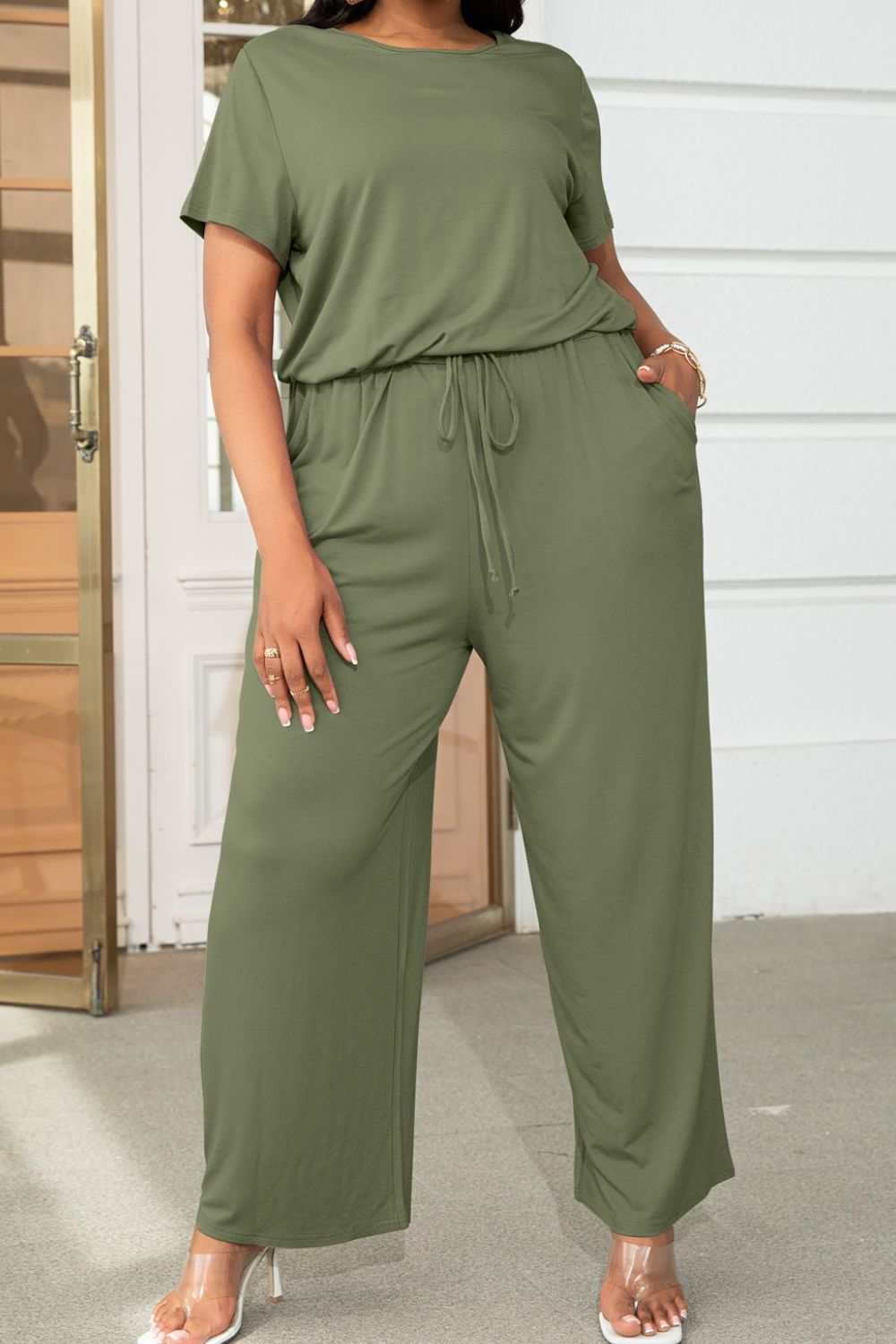 Get trendy with Plus Size Drawstring Waist Short Sleeve Jumpsuit - Plus size available at Styles Code. Grab yours today!