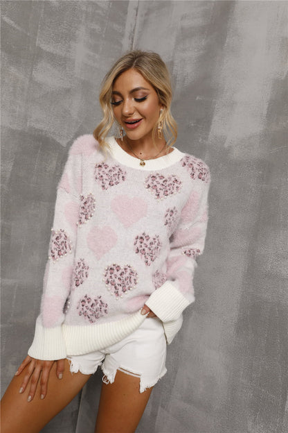 Get trendy with Heart Pattern Round Neck Long Sleeve Sweater - Sweater available at Styles Code. Grab yours today!