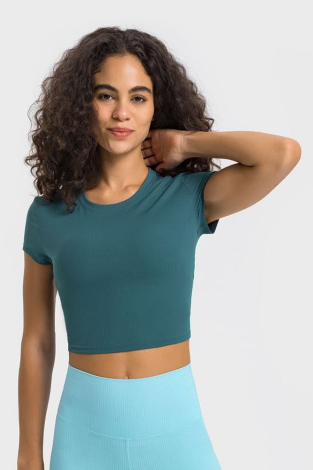 Get trendy with Round Neck Short Sleeve Cropped Sports T-Shirt - Activewear available at Styles Code. Grab yours today!