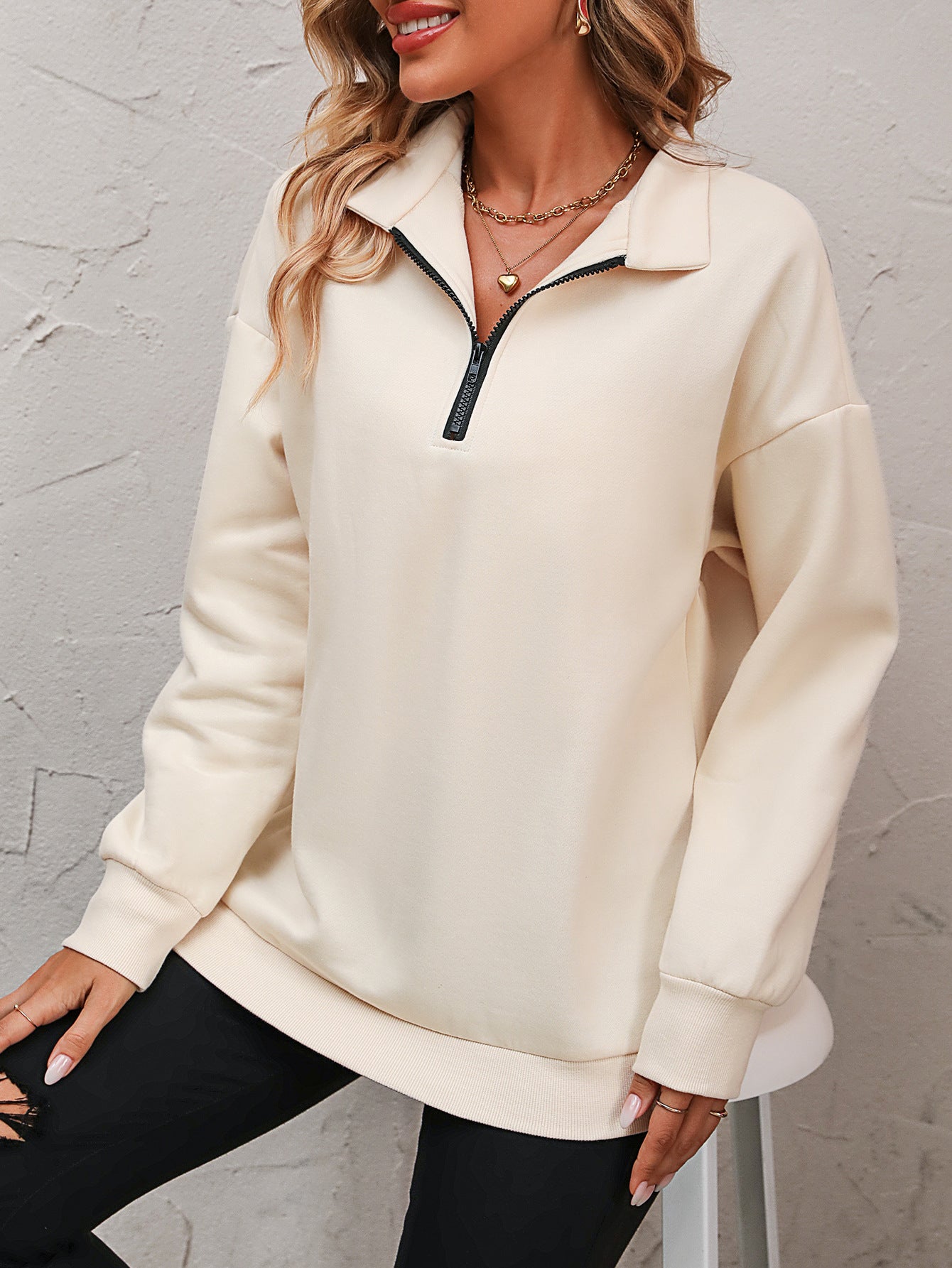 Get trendy with Zip-Up Dropped Shoulder Sweatshirt - Tops available at Styles Code. Grab yours today!