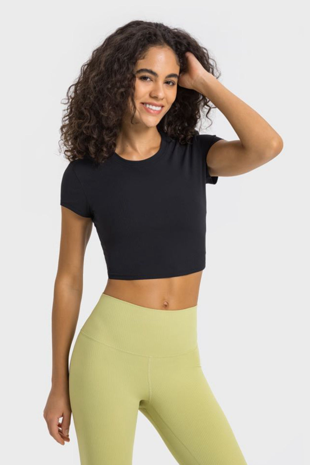 Get trendy with Round Neck Short Sleeve Cropped Sports T-Shirt - Activewear available at Styles Code. Grab yours today!