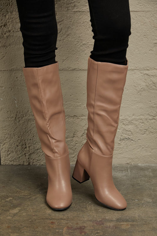 Get trendy with East Lion Corp Block Heel Knee High Boots - Luxe available at Styles Code. Grab yours today!