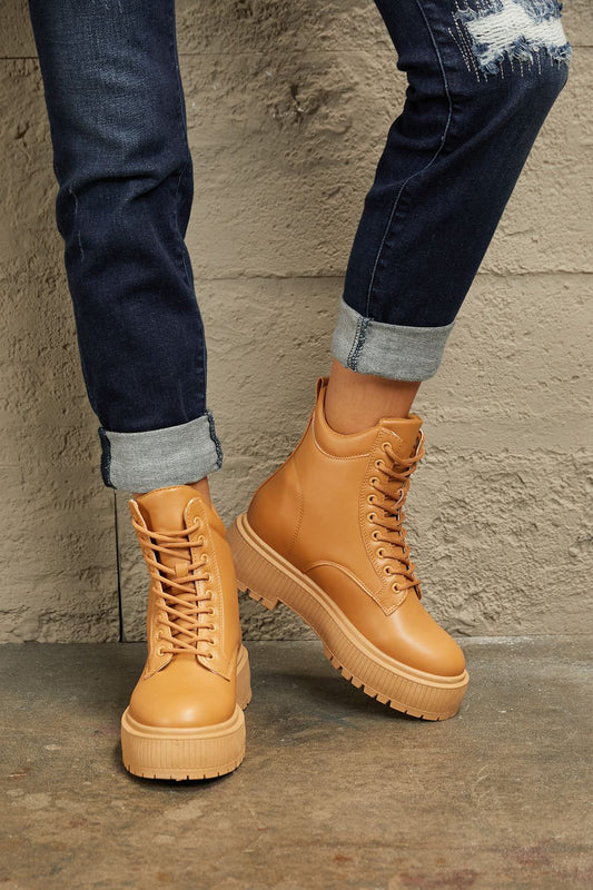 Get trendy with East Lion Corp Platform Combat Boots - Luxe available at Styles Code. Grab yours today!