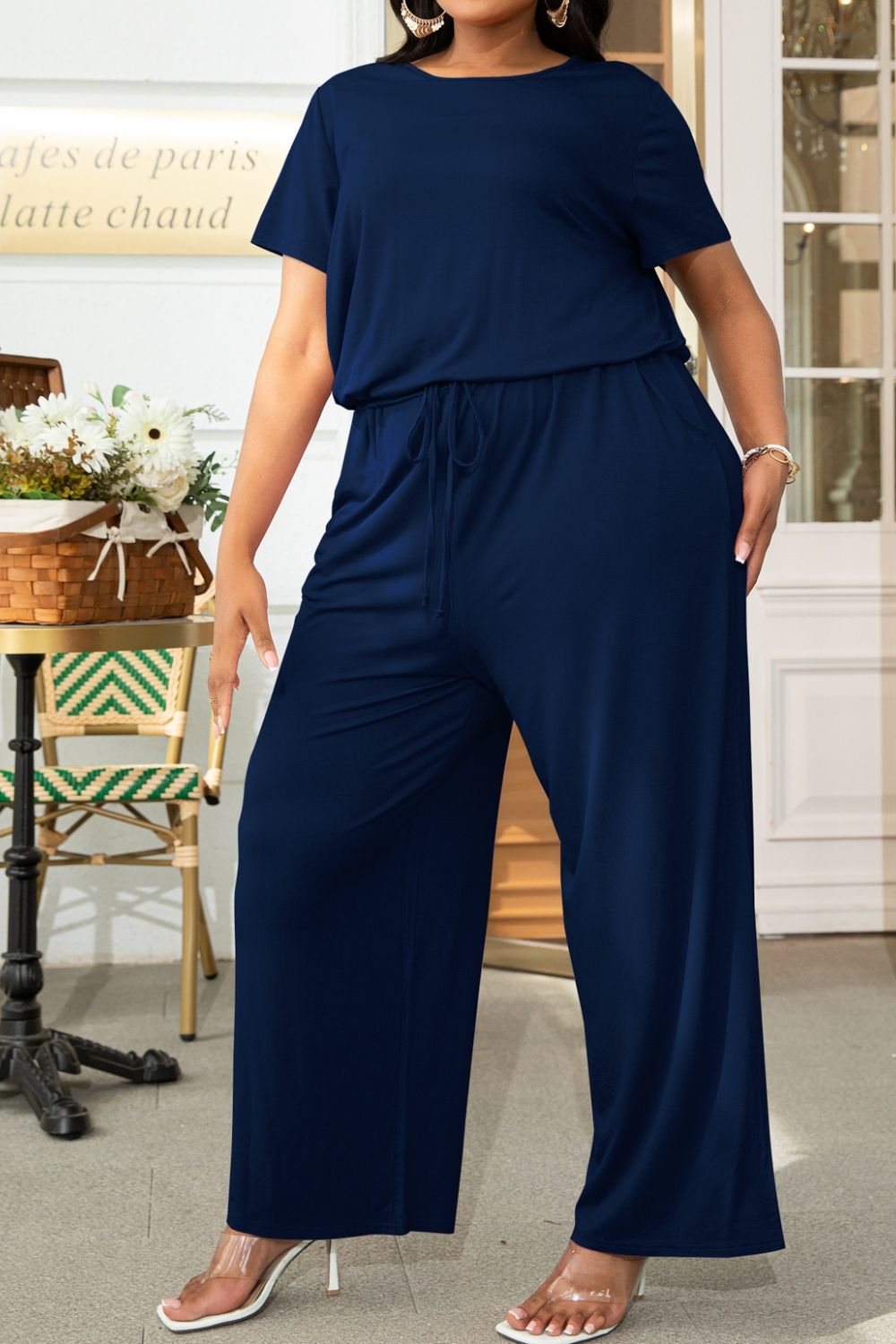 Get trendy with Plus Size Drawstring Waist Short Sleeve Jumpsuit - Plus size available at Styles Code. Grab yours today!