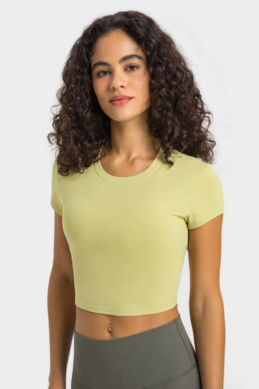 Get trendy with Round Neck Short Sleeve Cropped Sports T-Shirt - Activewear available at Styles Code. Grab yours today!