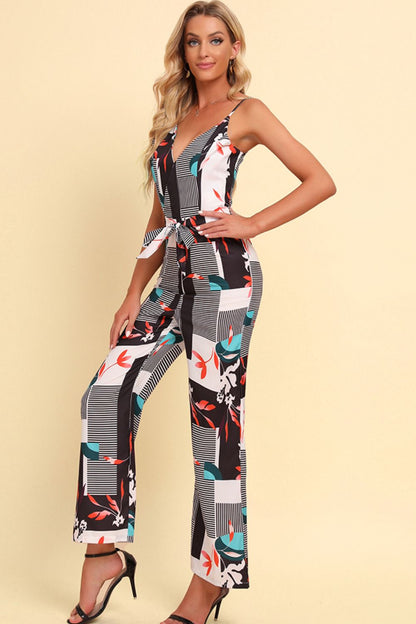 Get trendy with Printed Spaghetti Strap Tied Jumpsuit - Jumpsuits available at Styles Code. Grab yours today!