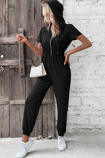 Get trendy with Zip-Up Short Sleeve Hooded Jumpsuit with Pockets - Jumpsuits available at Styles Code. Grab yours today!