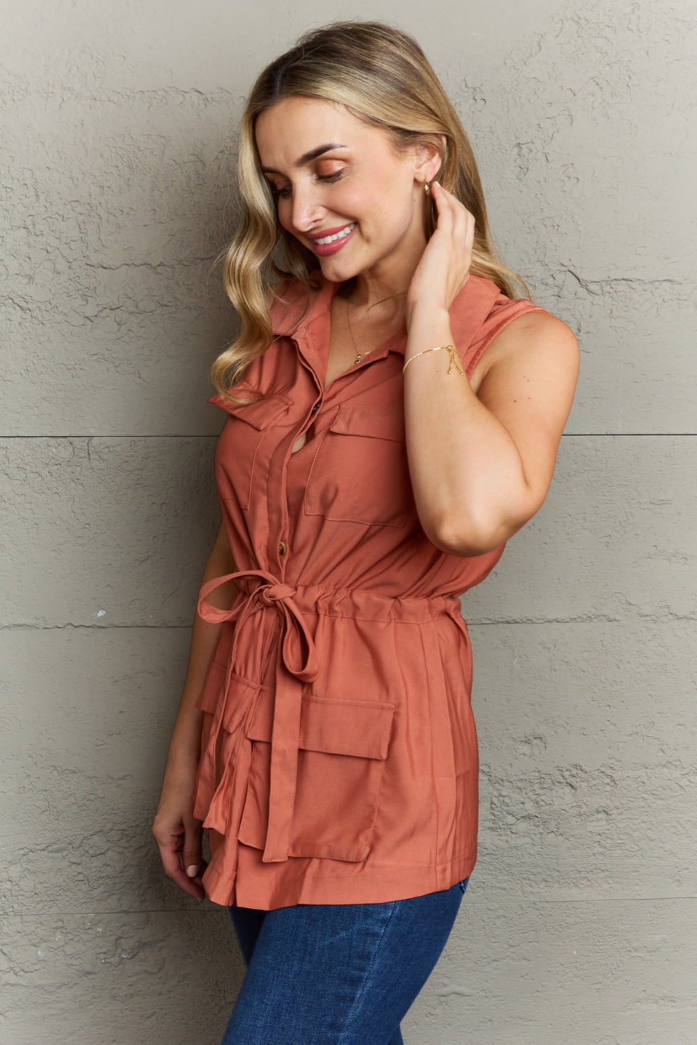 Get trendy with Sleeveless Collared Button Down Top -  available at Styles Code. Grab yours today!