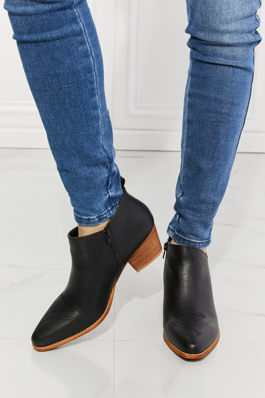 Get trendy with MMShoes Trust Yourself Embroidered Crossover Cowboy Bootie in Black - Shoes available at Styles Code. Grab yours today!