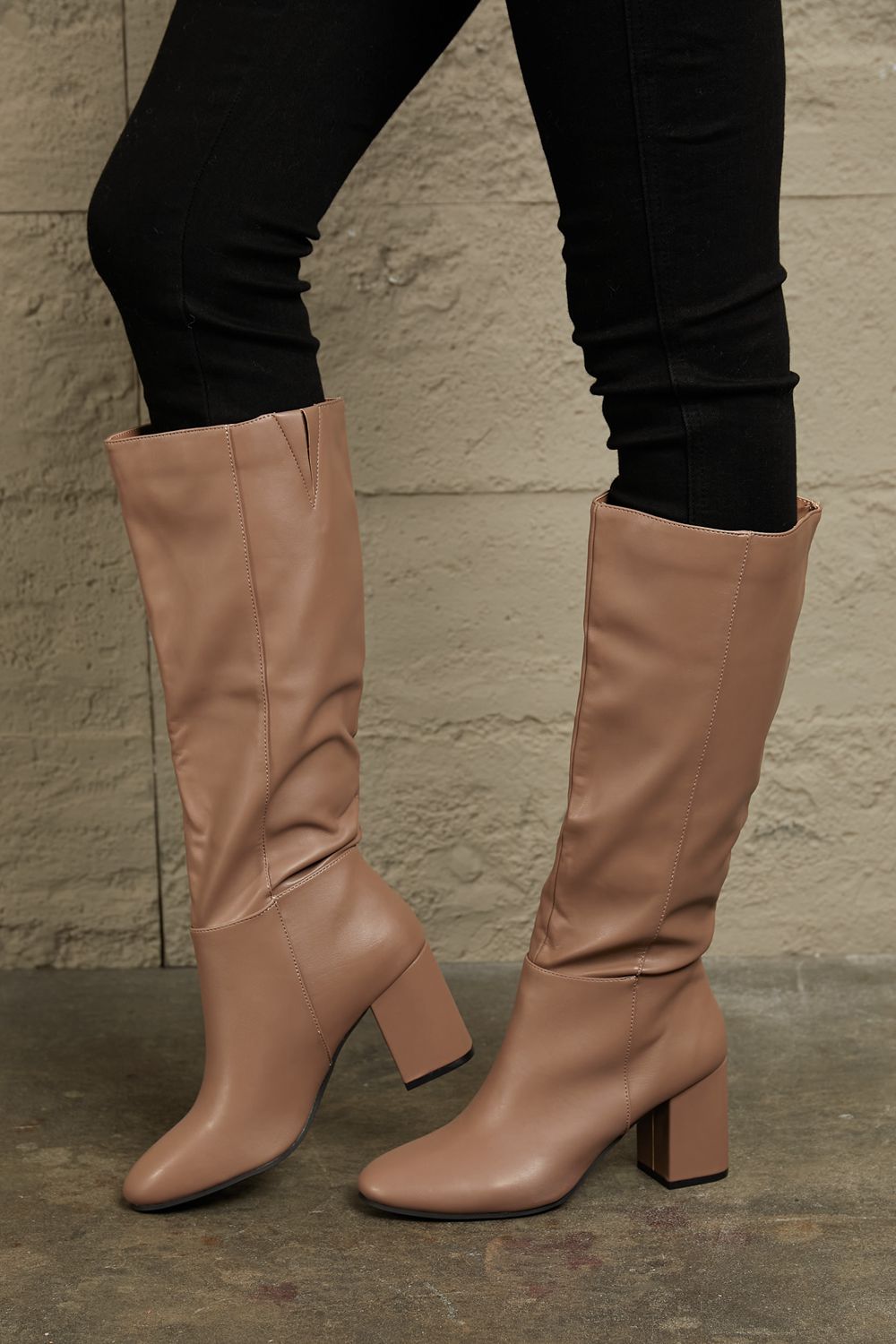 Get trendy with East Lion Corp Block Heel Knee High Boots - Luxe available at Styles Code. Grab yours today!