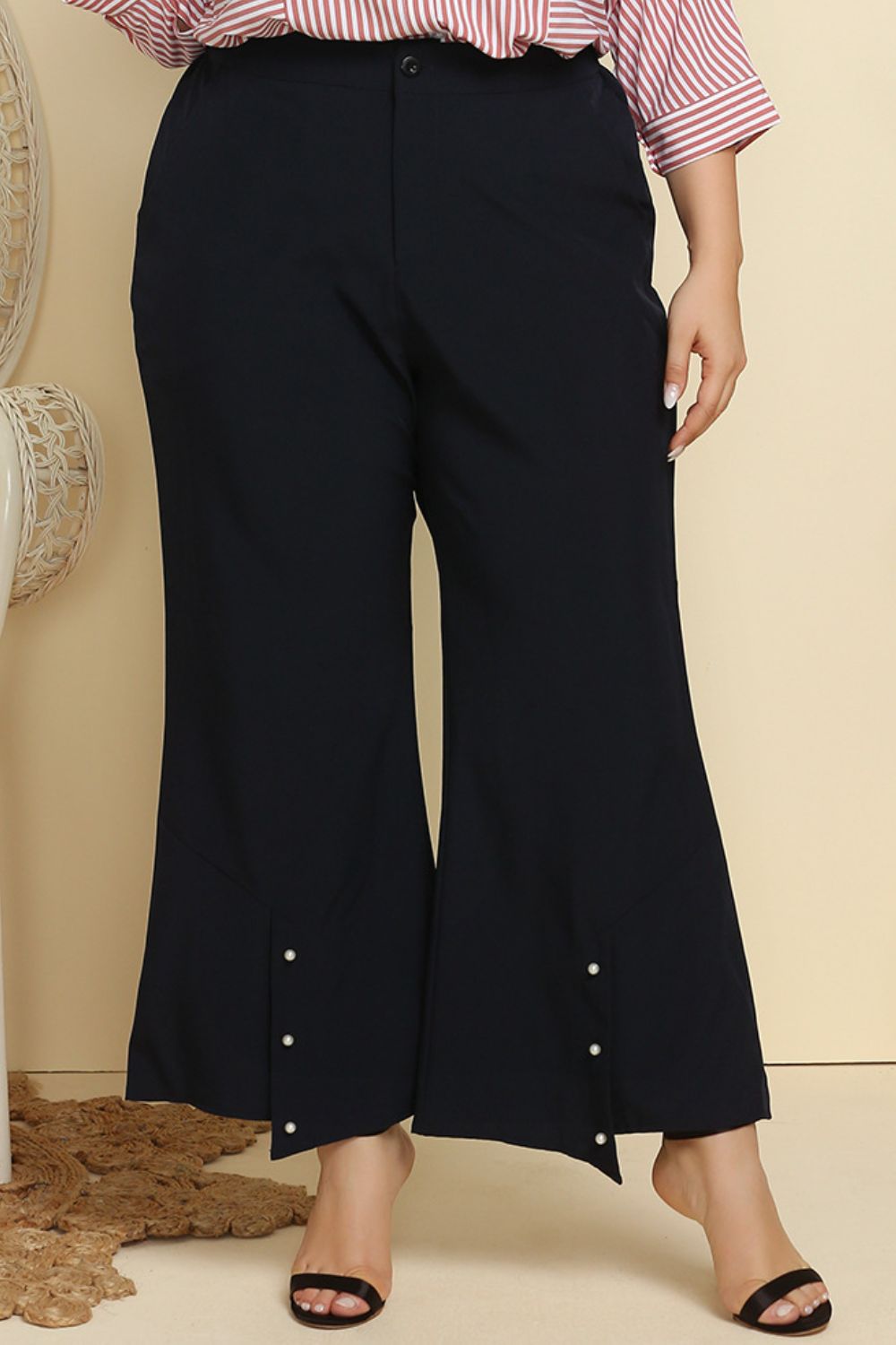 Get trendy with Plus Size Hem Detail Flare Pants - Plus Size available at Styles Code. Grab yours today!