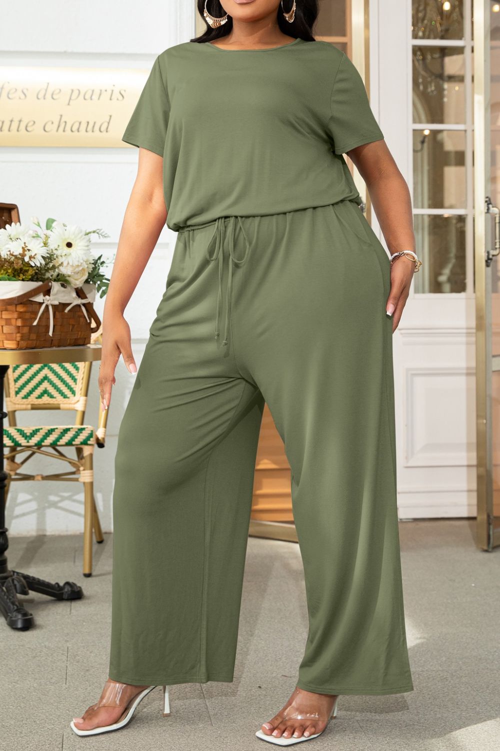 Get trendy with Plus Size Drawstring Waist Short Sleeve Jumpsuit - Plus size available at Styles Code. Grab yours today!