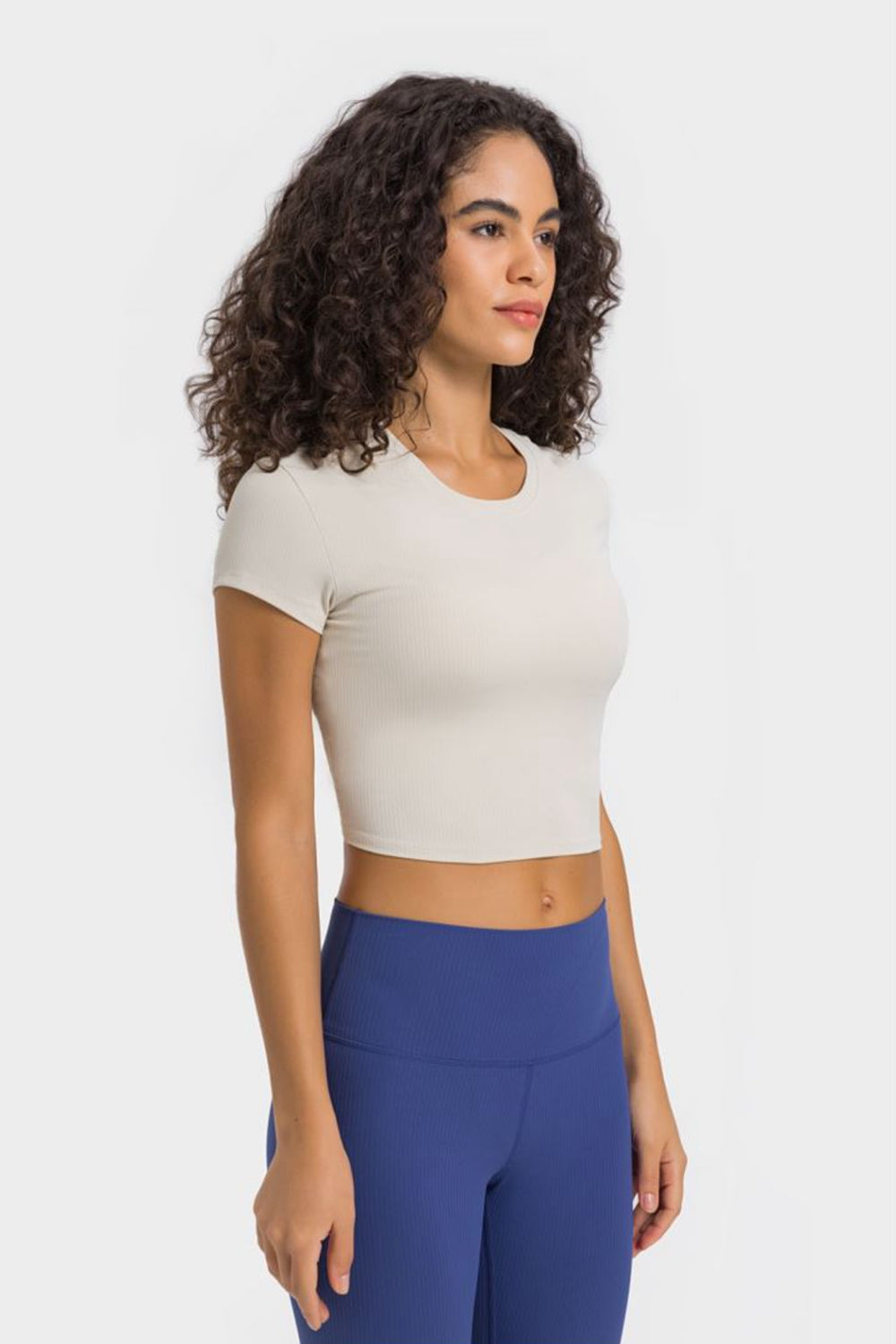 Get trendy with Round Neck Short Sleeve Cropped Sports T-Shirt - Activewear available at Styles Code. Grab yours today!