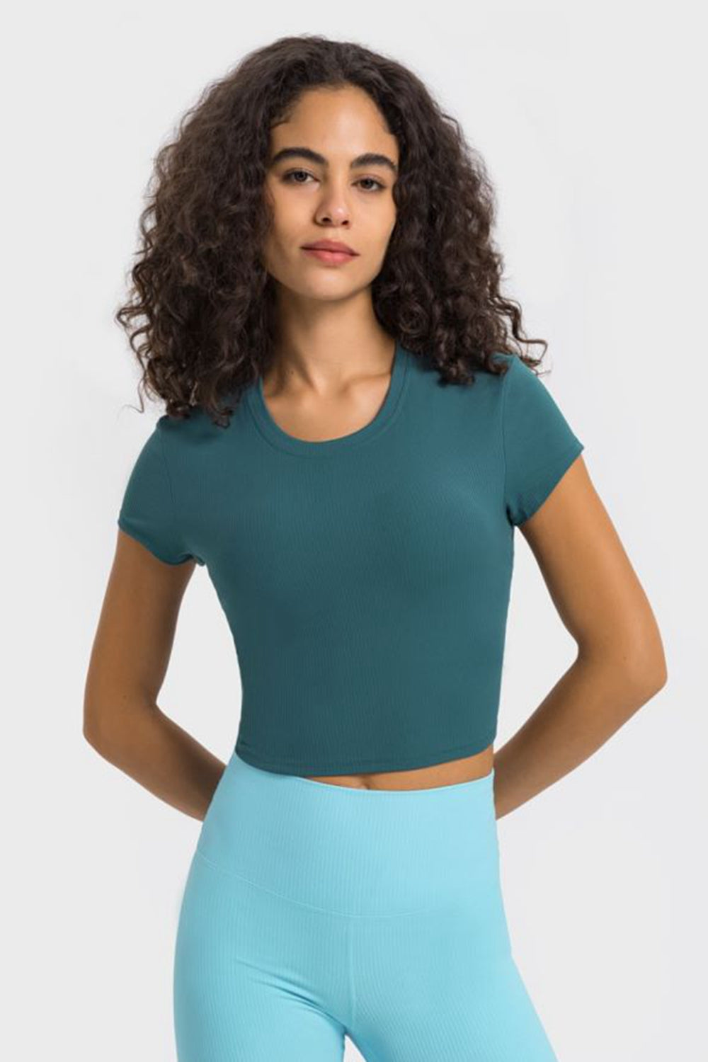 Get trendy with Round Neck Short Sleeve Cropped Sports T-Shirt - Activewear available at Styles Code. Grab yours today!