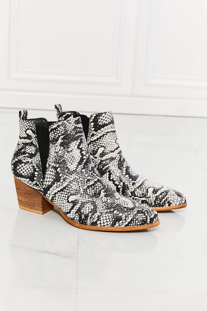 Get trendy with MMShoes Back At It Point Toe Bootie in Snakeskin - Shoes available at Styles Code. Grab yours today!