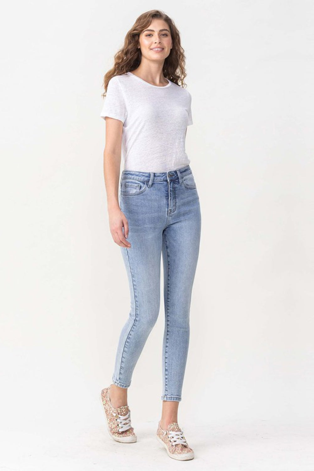 Get trendy with Lovervet Full Size Talia High Rise Crop Skinny Jeans - Jeans available at Styles Code. Grab yours today!